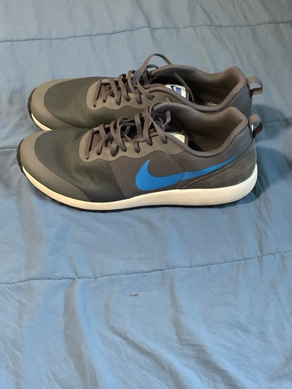 Nike Gray Sneakers with Blue Swoosh
